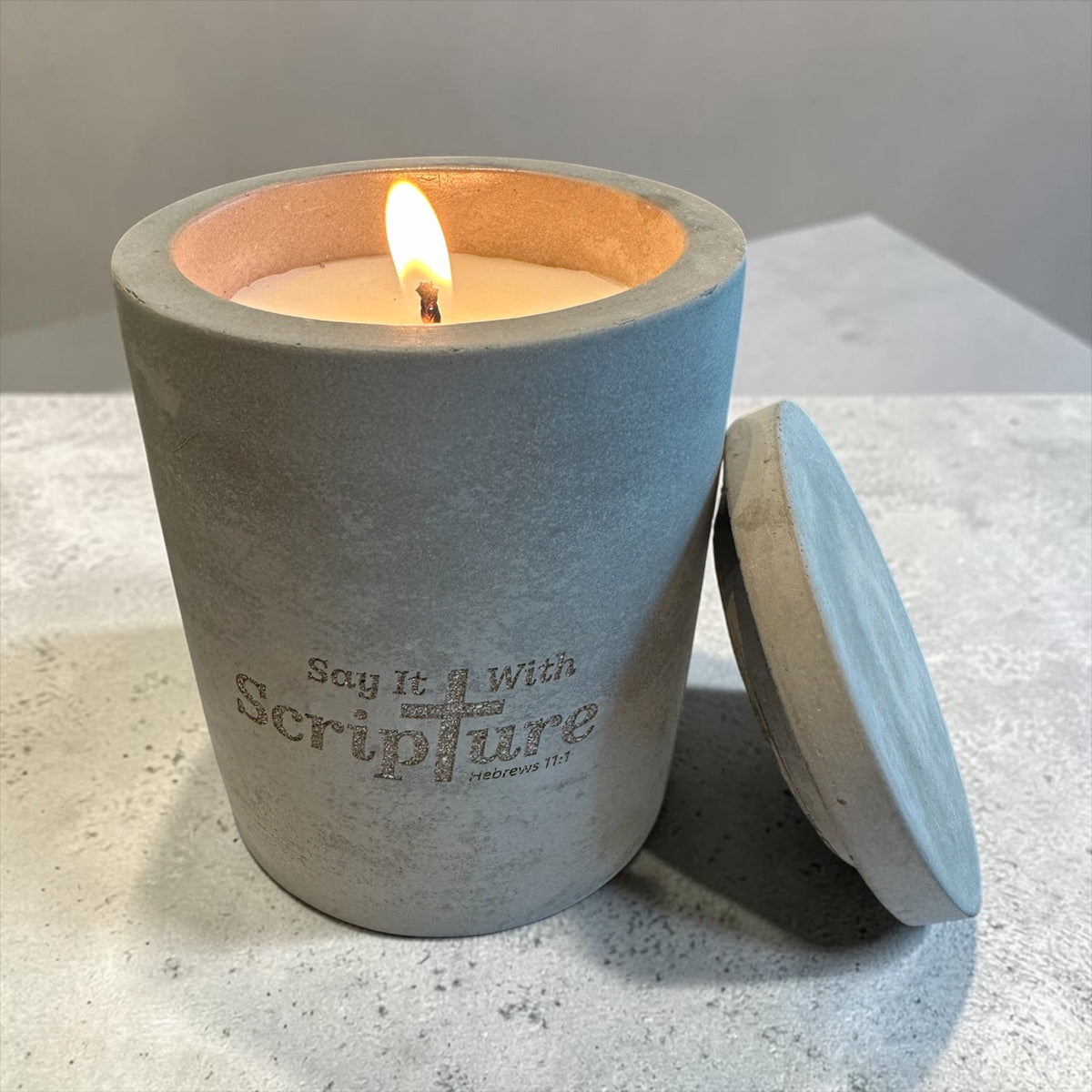 Say It With Scripture concrete candle lit with matching lid